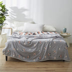 Coperta elegante con delicato motivo a foglie