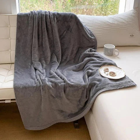 Coperta impermeabile CozyGuard – reversibile, antimacchia e morbidissima
