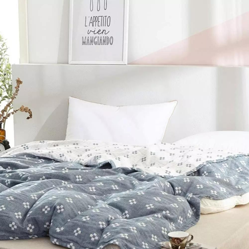 Coperta in cotone con motivo geometrico