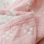 Coperta in cotone con motivo geometrico