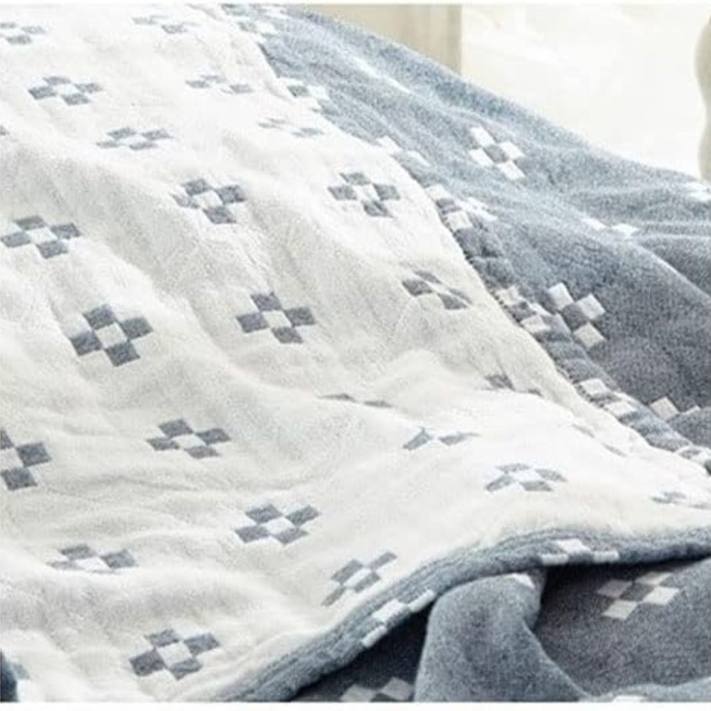 Coperta in cotone con motivo geometrico