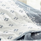 Coperta in cotone con motivo geometrico