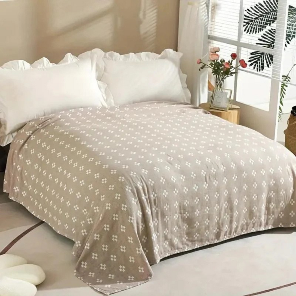 Coperta in cotone con motivo geometrico