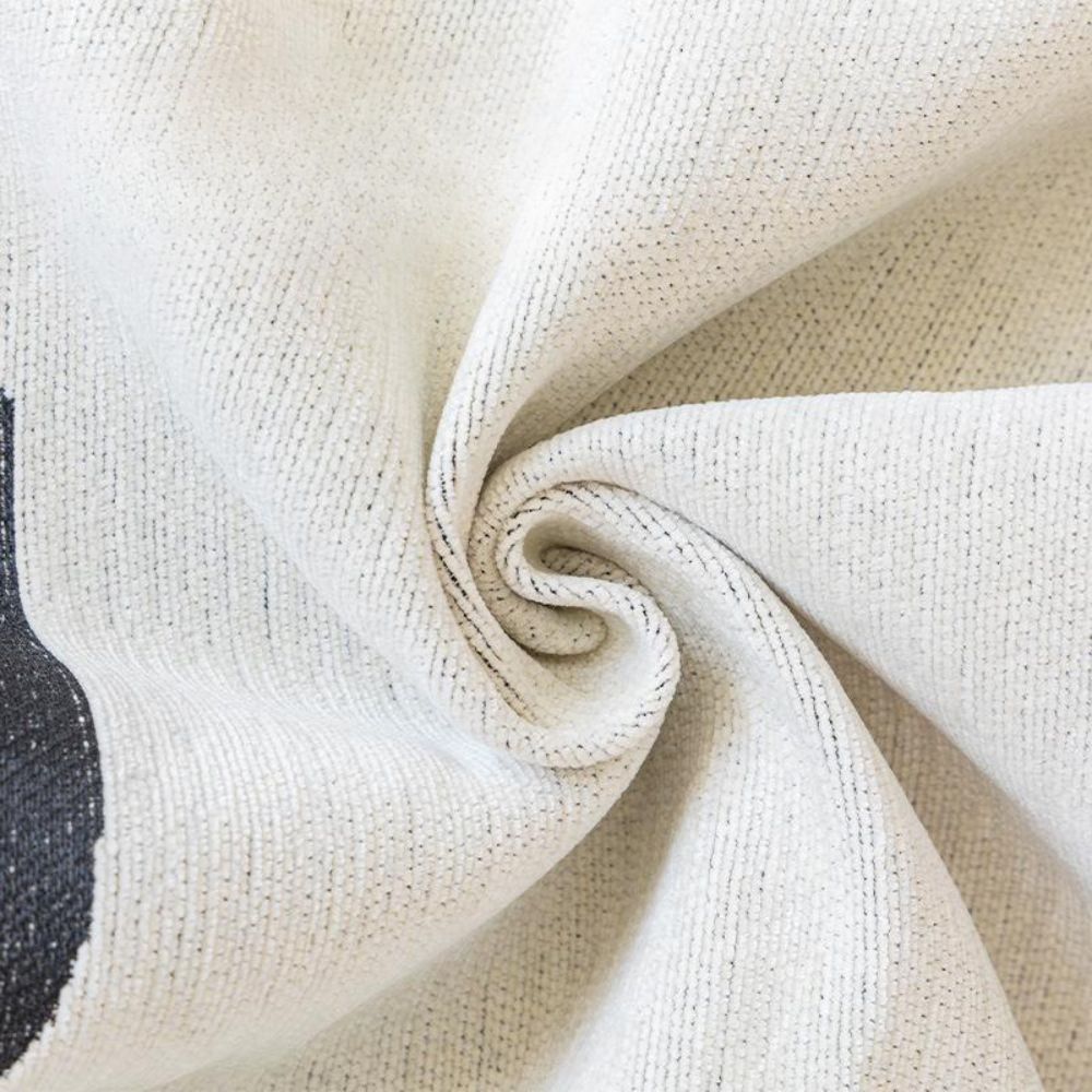 Copridivano a onde curve con frange decorative