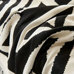 Copridivano con nappine decorative
