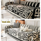 Copridivano con nappine decorative