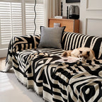 Copridivano con nappine decorative