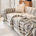 Copridivano con nappine decorative