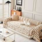 Copridivano con nappine decorative