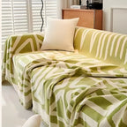 Copridivano con nappine decorative
