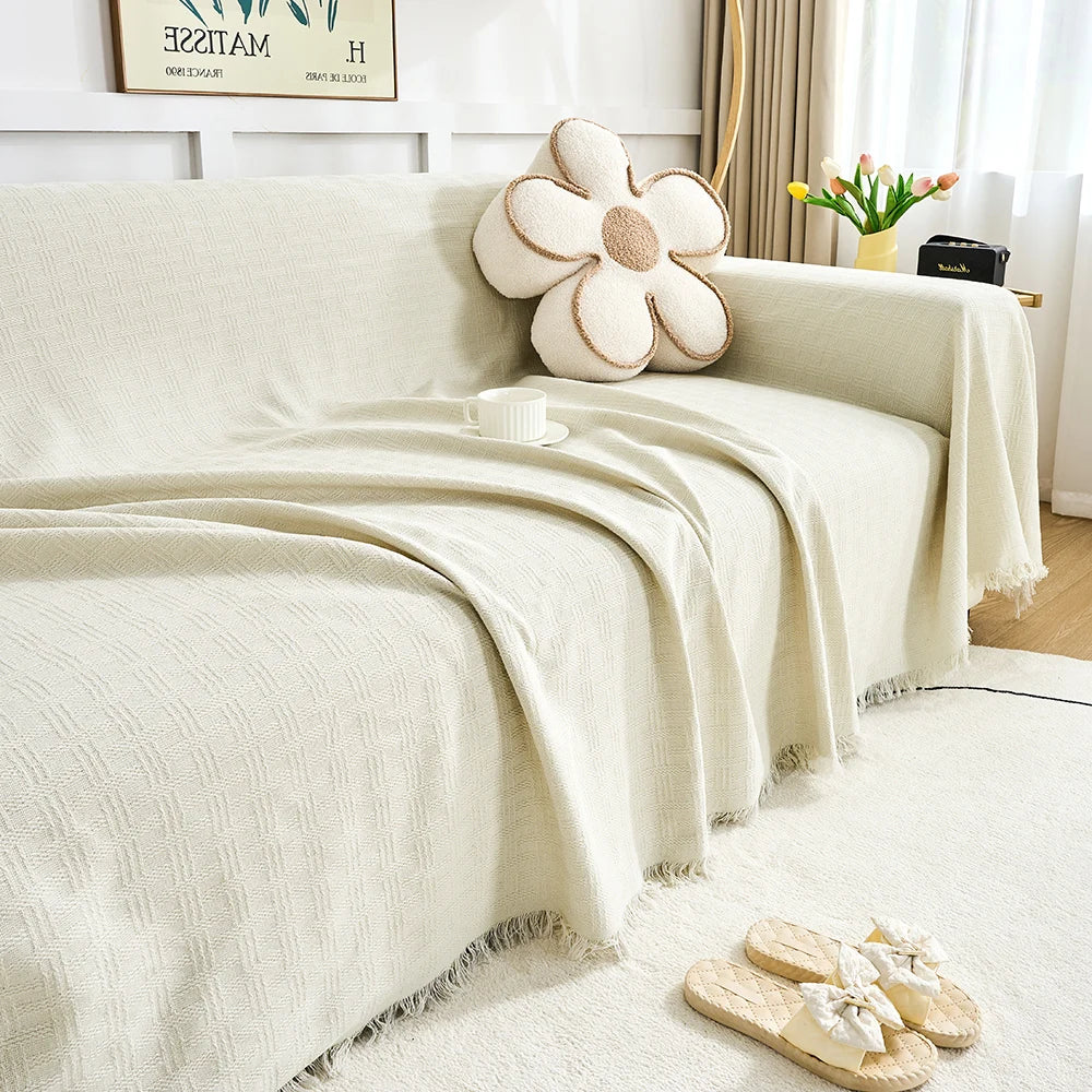 Copridivano reversibile CasaLunea con frange decorative