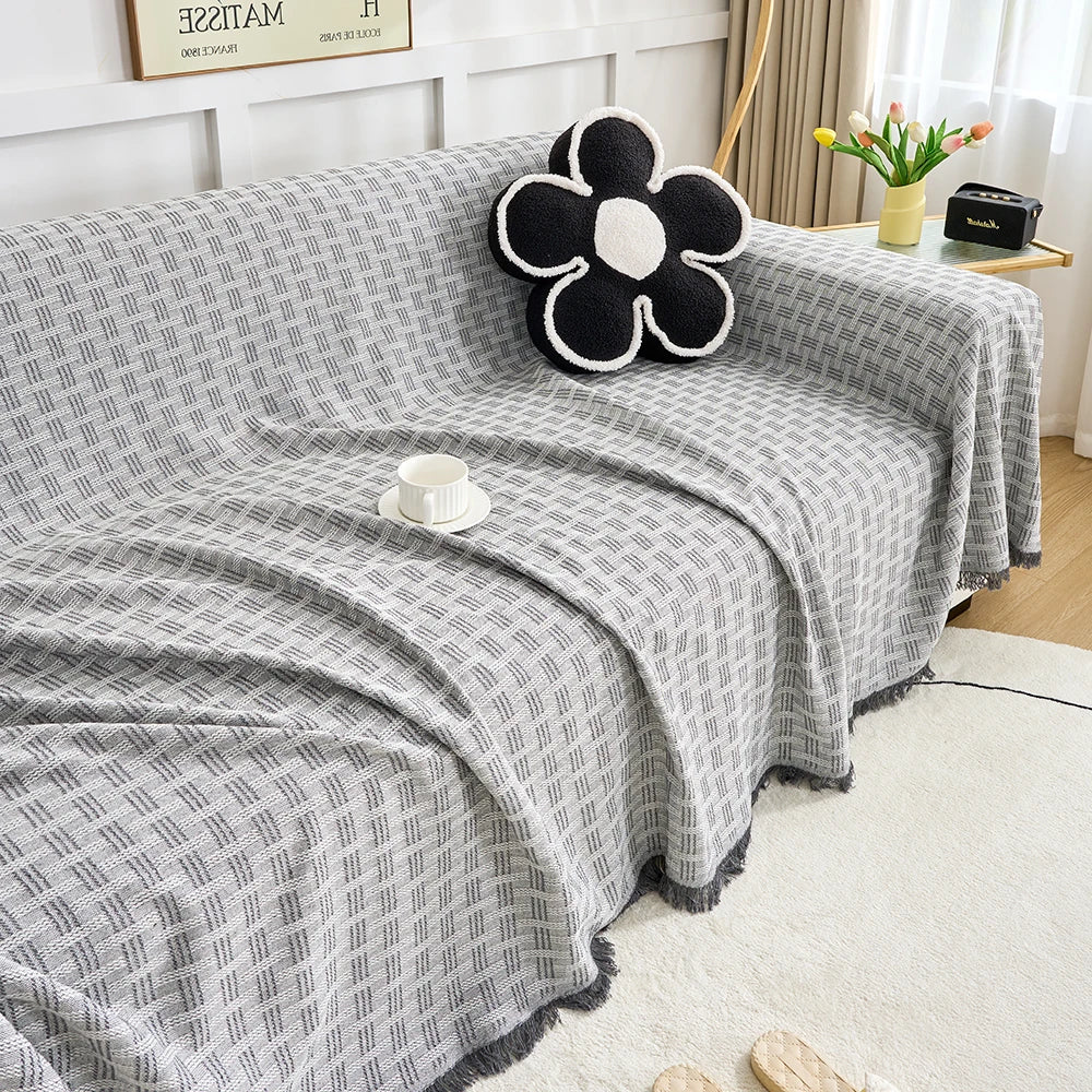 Copridivano reversibile CasaLunea con frange decorative