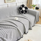 Copridivano reversibile CasaLunea con frange decorative