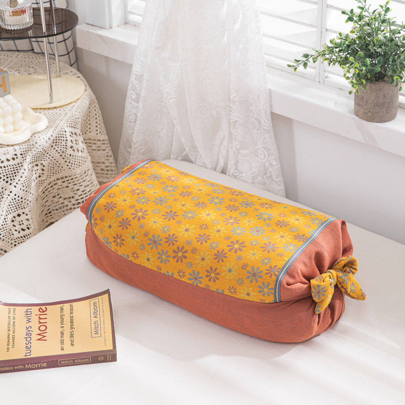 Cuscino cilindrico decorativo con motivo floreale