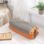 Cuscino cilindrico decorativo con motivo floreale
