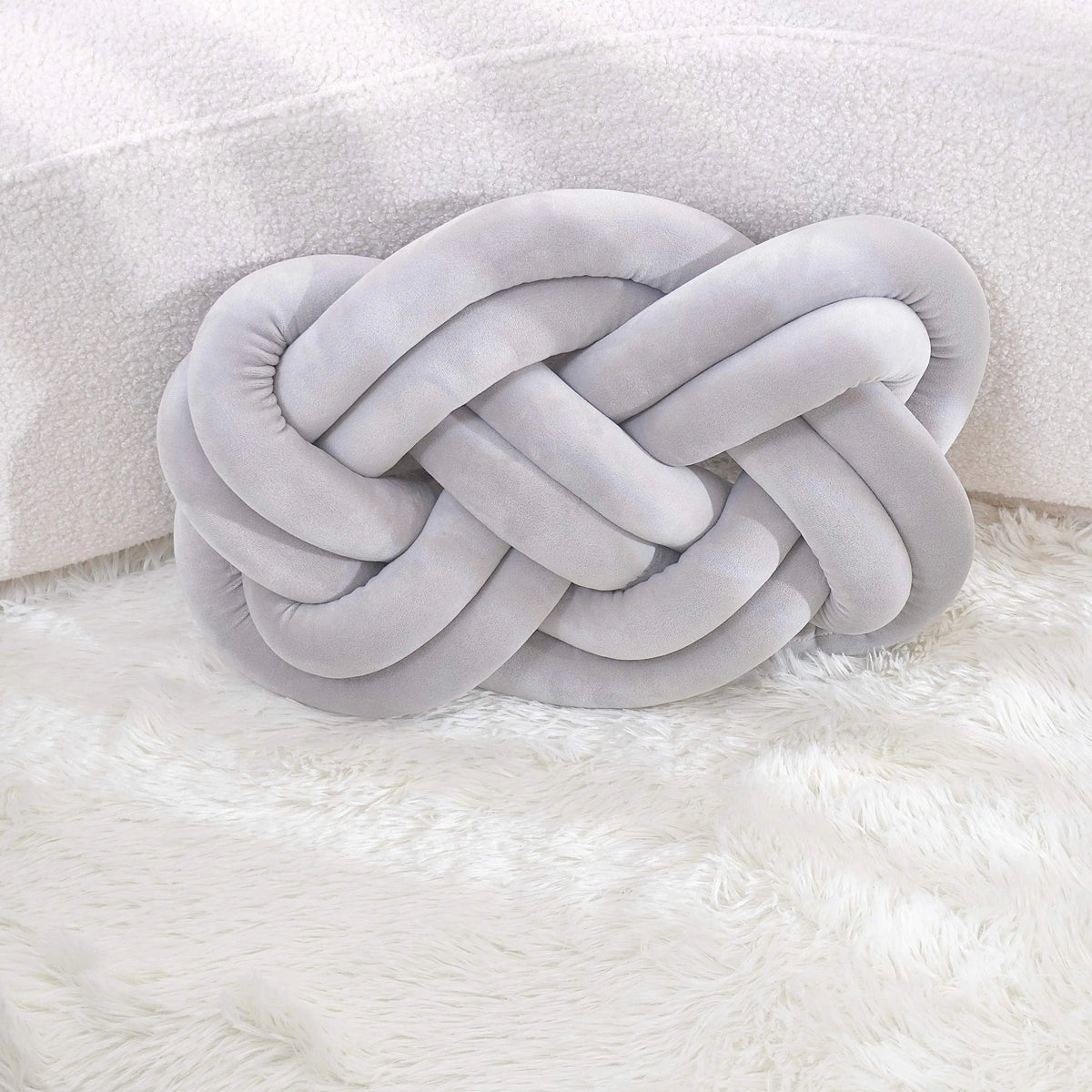 Cuscino decorativo con nodo geometrico lavabile 40×30 cm