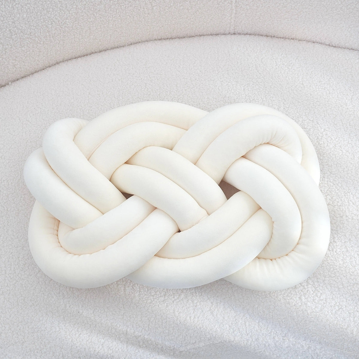 Cuscino decorativo con nodo geometrico lavabile 40×30 cm