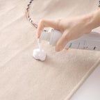 Detergente spray per abbigliamento e tessuti