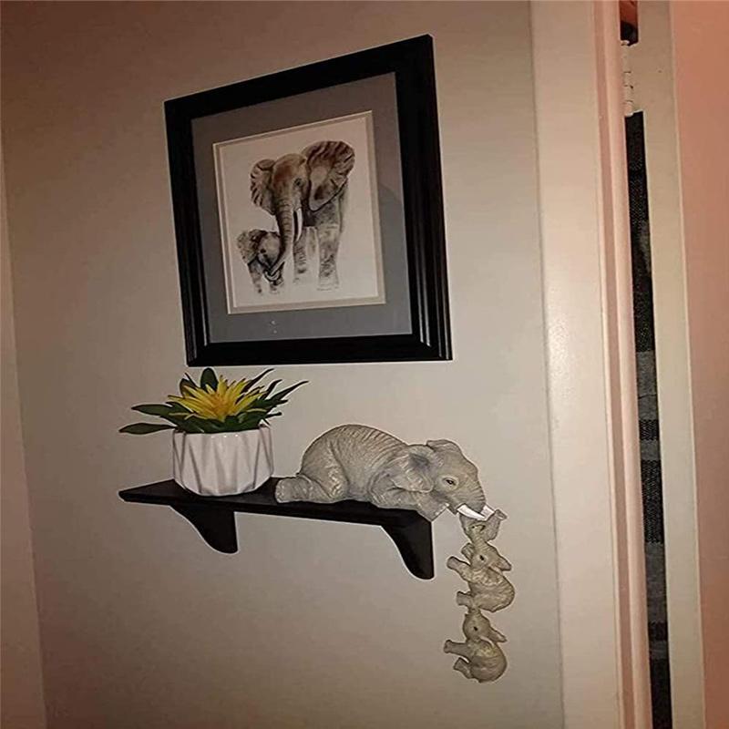 Elefanti seduti decorativi dipinti a mano