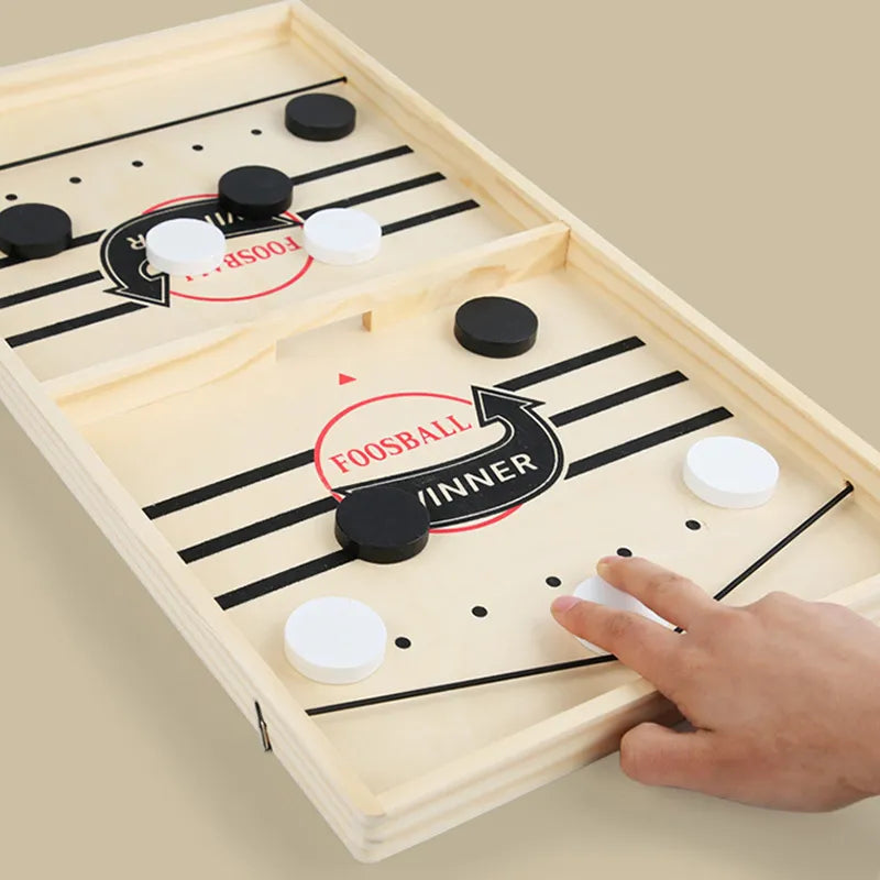 Gioco da tavolo con fionda e pedine