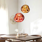 Jessamy | Lampada a sospensione globo in acrilico effetto fuso con finitura specchiata per sala da pranzo e cucina