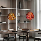 Jessamy | Lampada a sospensione globo in acrilico effetto fuso con finitura specchiata per sala da pranzo e cucina