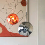 Jessamy | Lampada a sospensione globo in acrilico effetto fuso con finitura specchiata per sala da pranzo e cucina