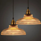 Lampada a sospensione in vetro con diffusione luminosa elegante