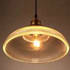 Lampada a sospensione in vetro con diffusione luminosa elegante
