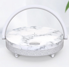 Lampada da comodino multifunzione con ricarica wireless, supporto telefono, speaker Bluetooth e luce regolabile