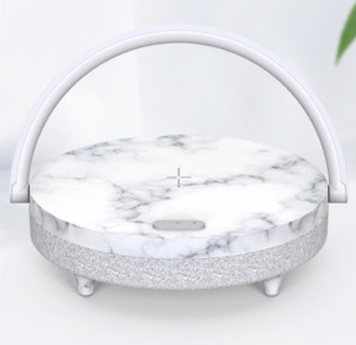Lampada da comodino multifunzione con ricarica wireless, supporto telefono, speaker Bluetooth e luce regolabile