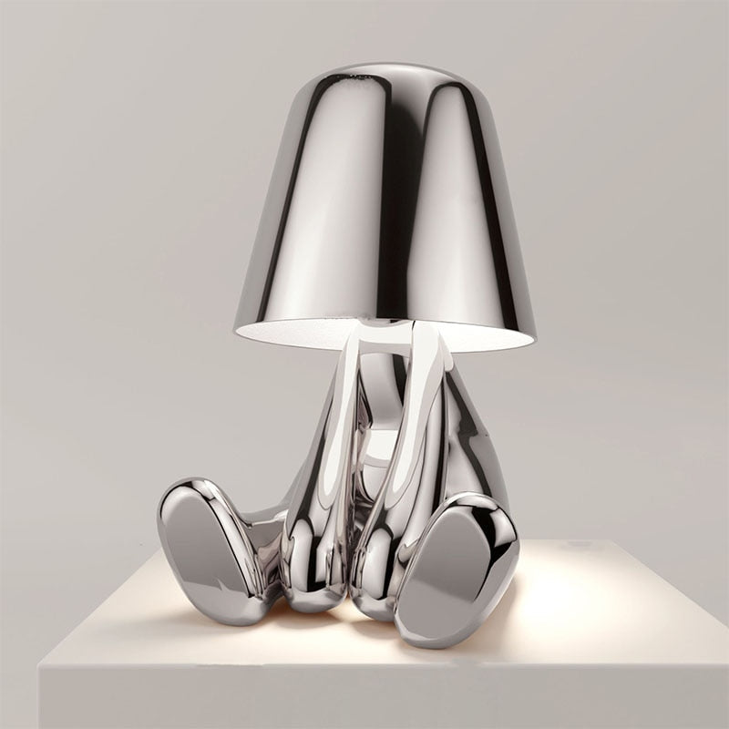 Lampada da comodino ricaricabile con figura decorativa moderna