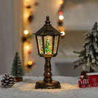 Lanterna natalizia con neve e luci decorative