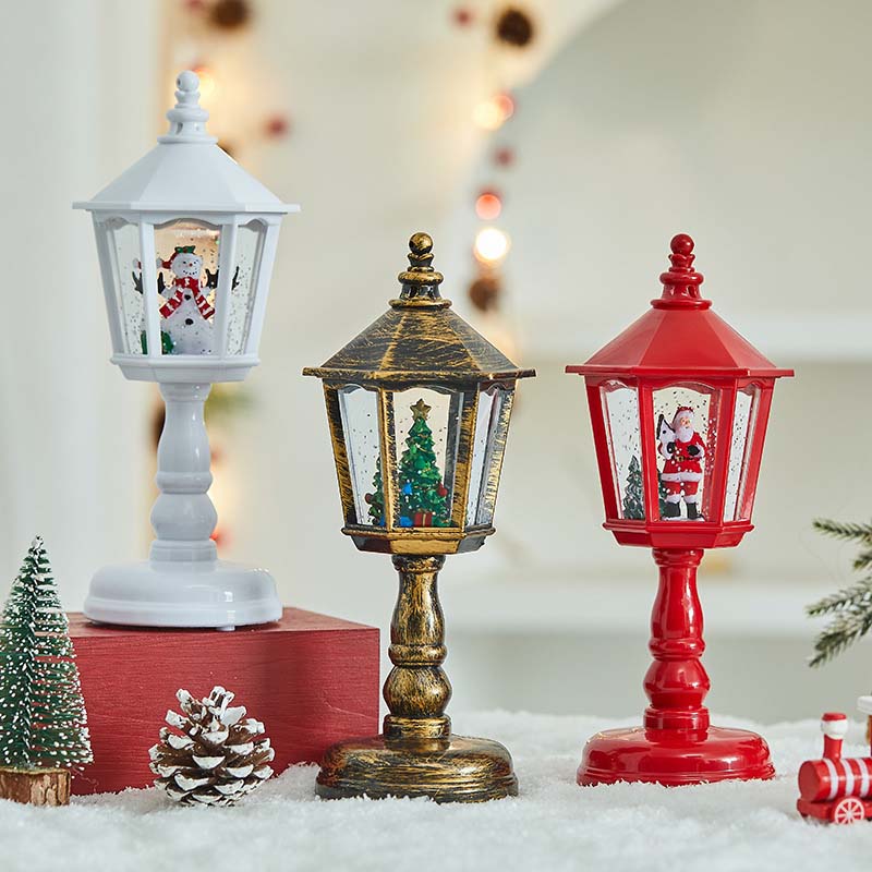 Lanterna natalizia con neve e luci decorative