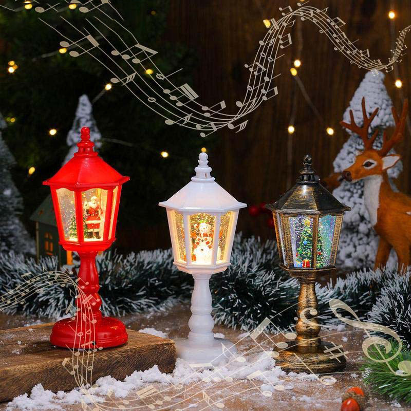 Lanterna natalizia con neve e luci decorative