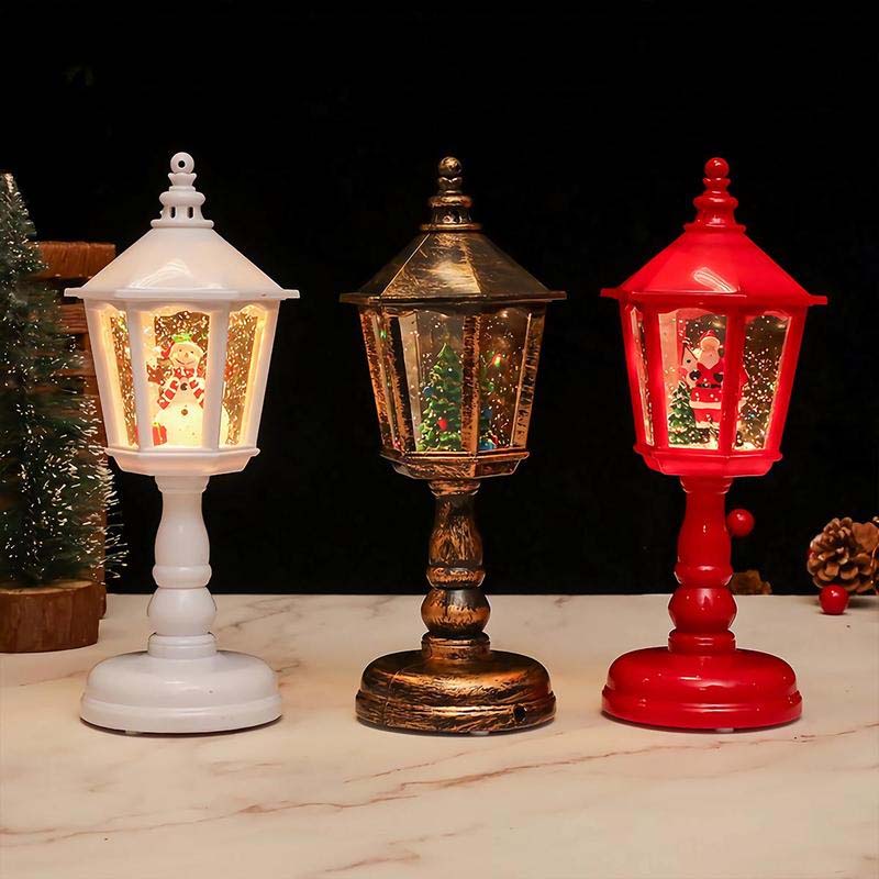 Lanterna natalizia con neve e luci decorative