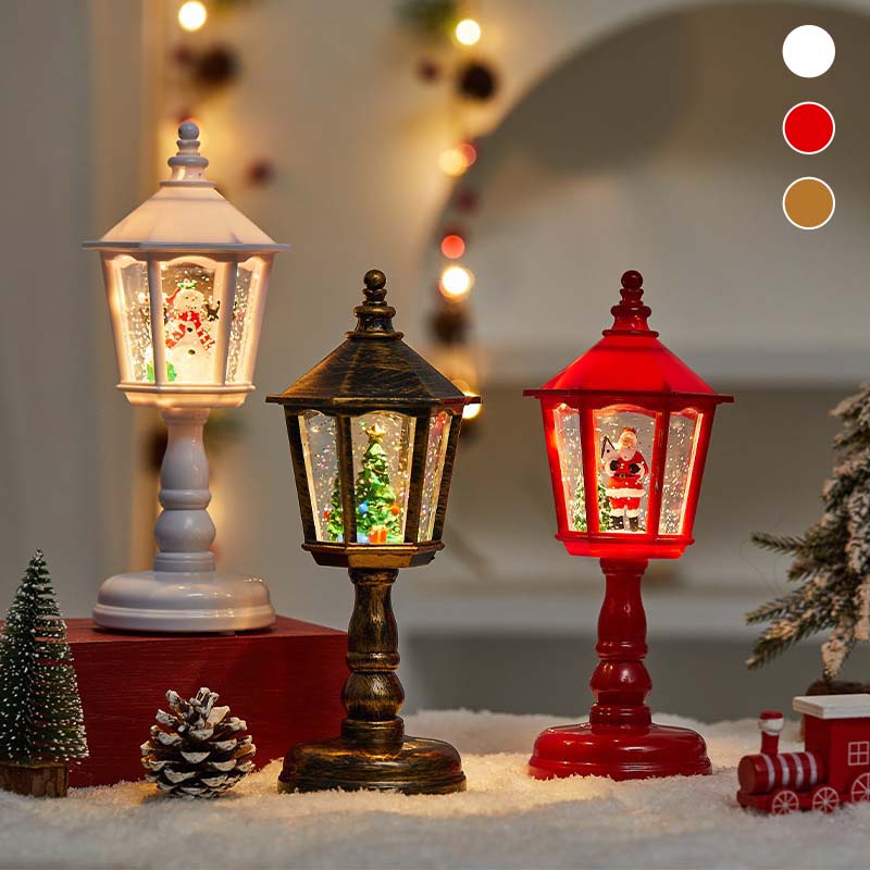 Lanterna natalizia con neve e luci decorative