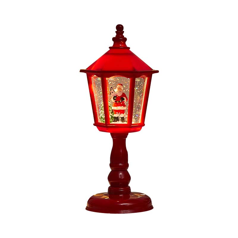 Lanterna natalizia con neve e luci decorative
