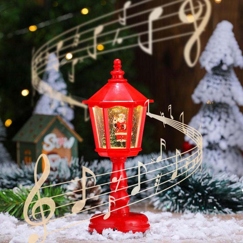Lanterna natalizia con neve e luci decorative