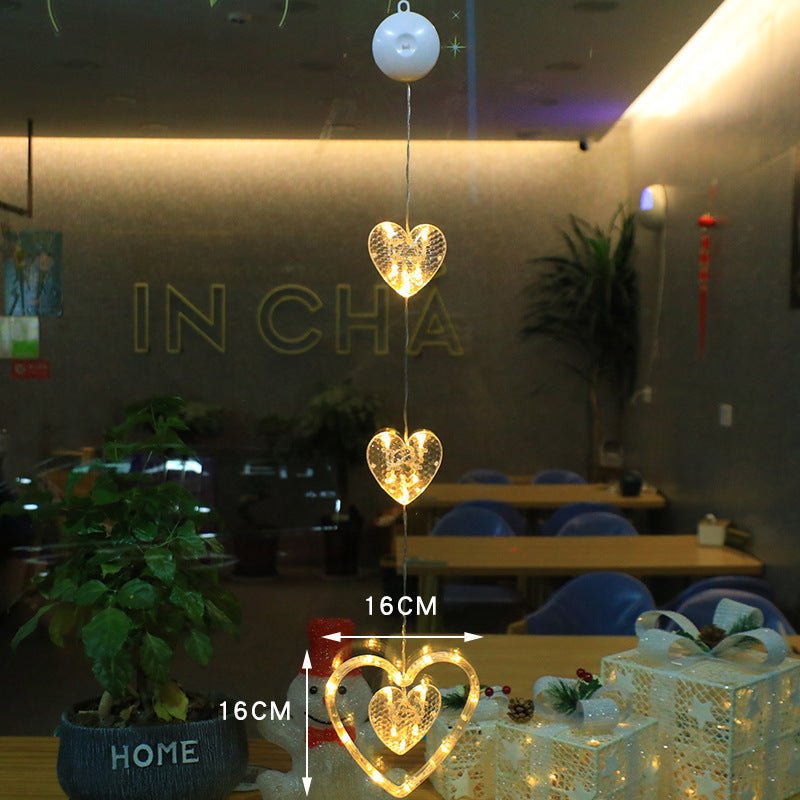 Luci LED natalizie con ventose per vetri e specchi