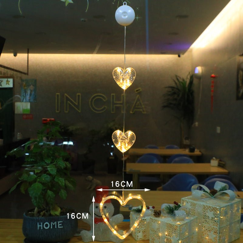 Luci LED natalizie con ventose per vetri e specchi