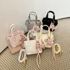 Mini borsa intrecciata con charm