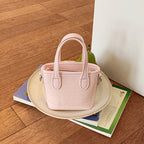 Mini borsa intrecciata con charm