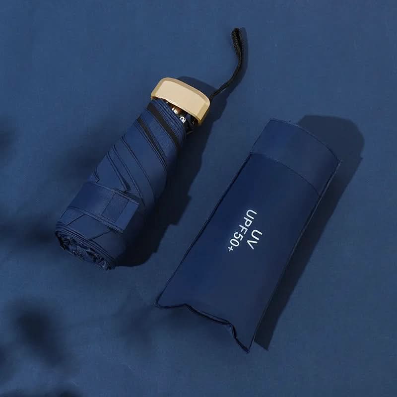 Mini ombrello pieghevole con protezione UV e tessuto idrorepellente