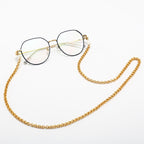 Occhiali con catena decorativa