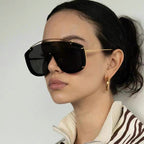 Occhiali da sole donna stile maschile con sfumature fashion e dettagli dorati