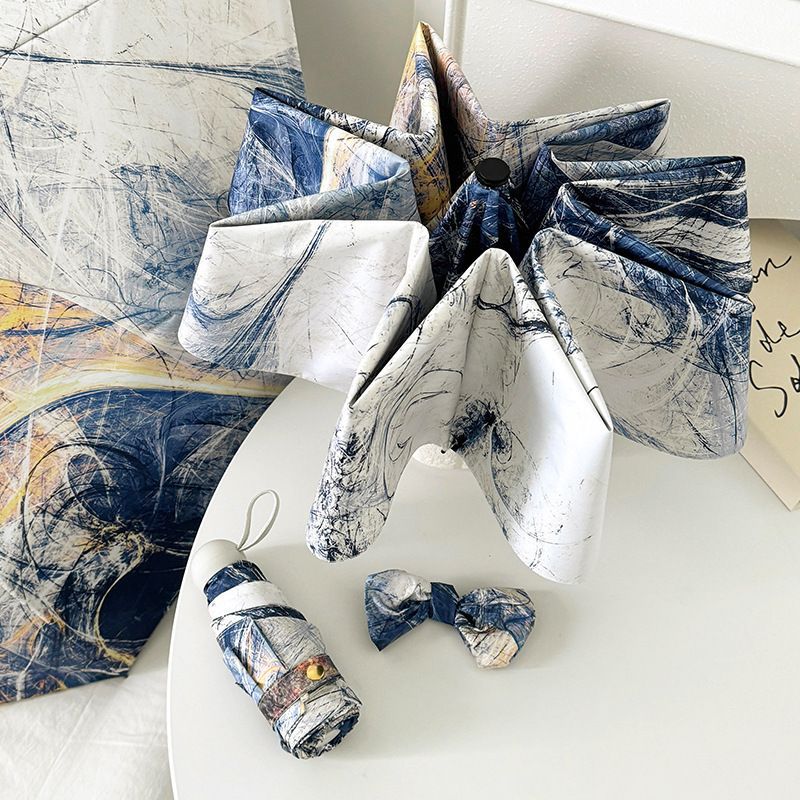 Ombrello pieghevole da donna con motivo artistico e apertura automatica