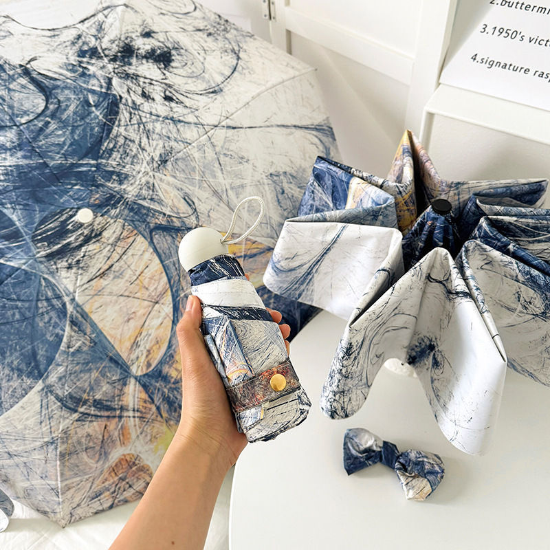Ombrello pieghevole da donna con motivo artistico e apertura automatica