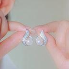 Orecchini eleganti con perle e strass
