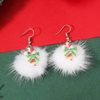 Orecchini natalizi con pon pon e fiocchi di neve
